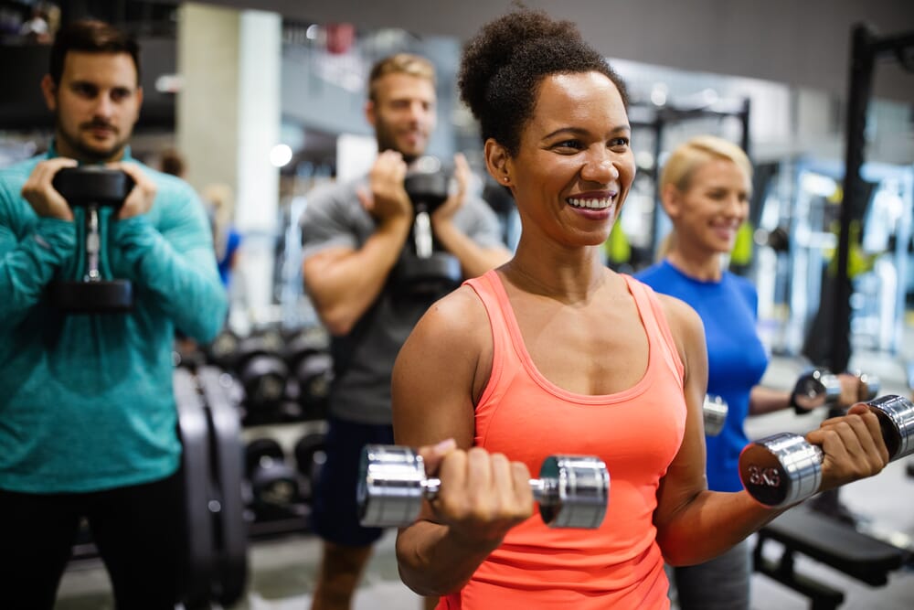 Fitness enthusiasts checking ClubRight for gym availability.
