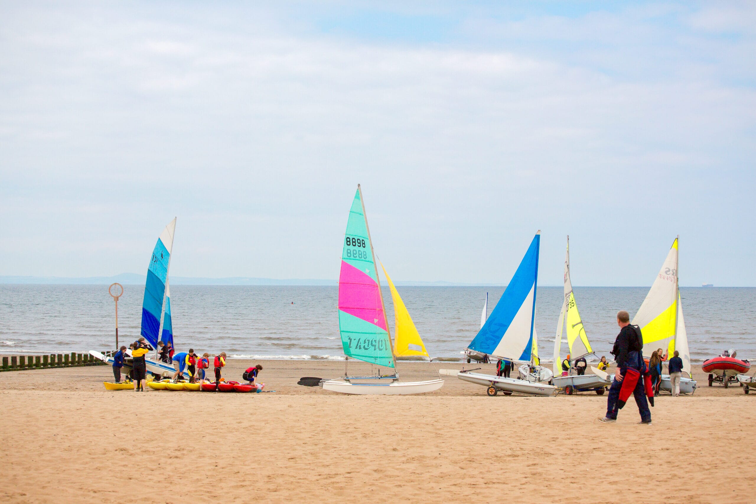 xPortobello Sailing and Kayaking Club members sailing on the Firth of Forth using Spond as their sailing club app.