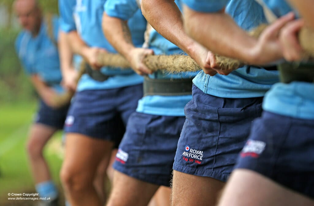 Teams competing in Tug of War, a sport removed from the Olympics