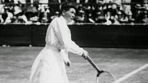 Charlotte Cooper, one of the greatest British sportswomen, holding her tennis racket after winning Wimbledon