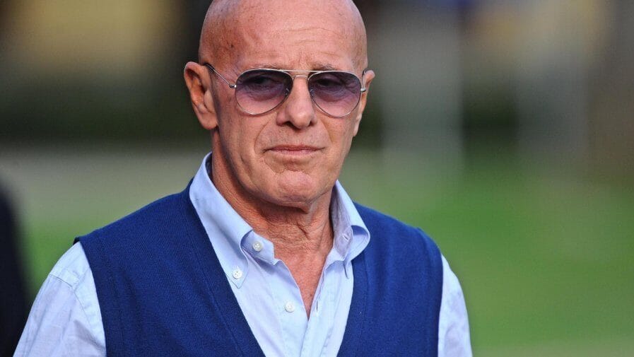 Arrigo Sacchi, one of the Greatest Football Managers, coaching AC Milan during a match.