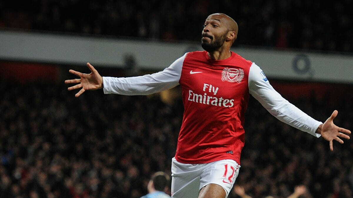 Thierry Henry volleying one of the Greatest Premier League Goals against Manchester United in 2000.