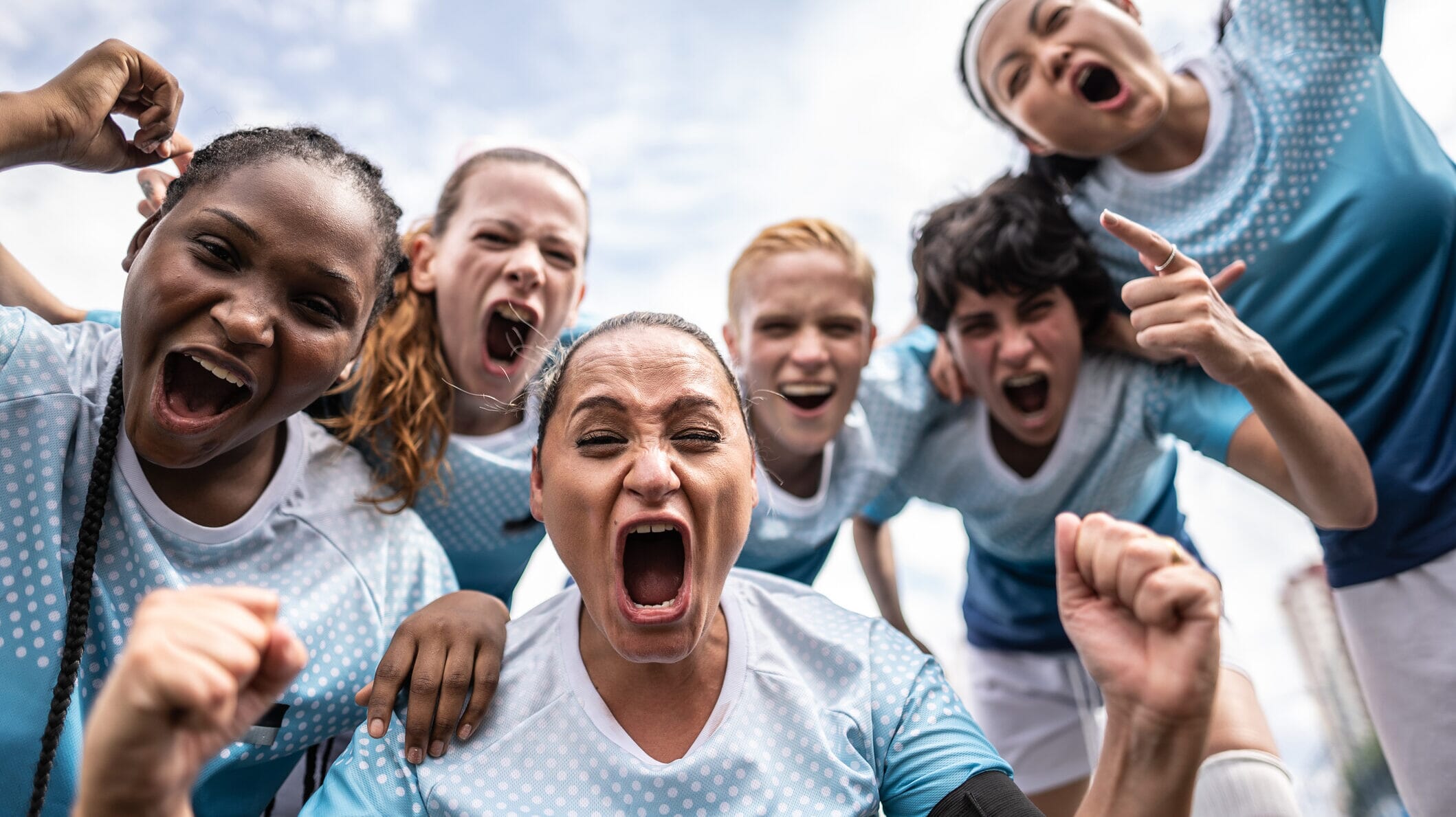 Excited grassroots teams celebrating record-breaking Spot the Ball fundraising success on Spond in February.