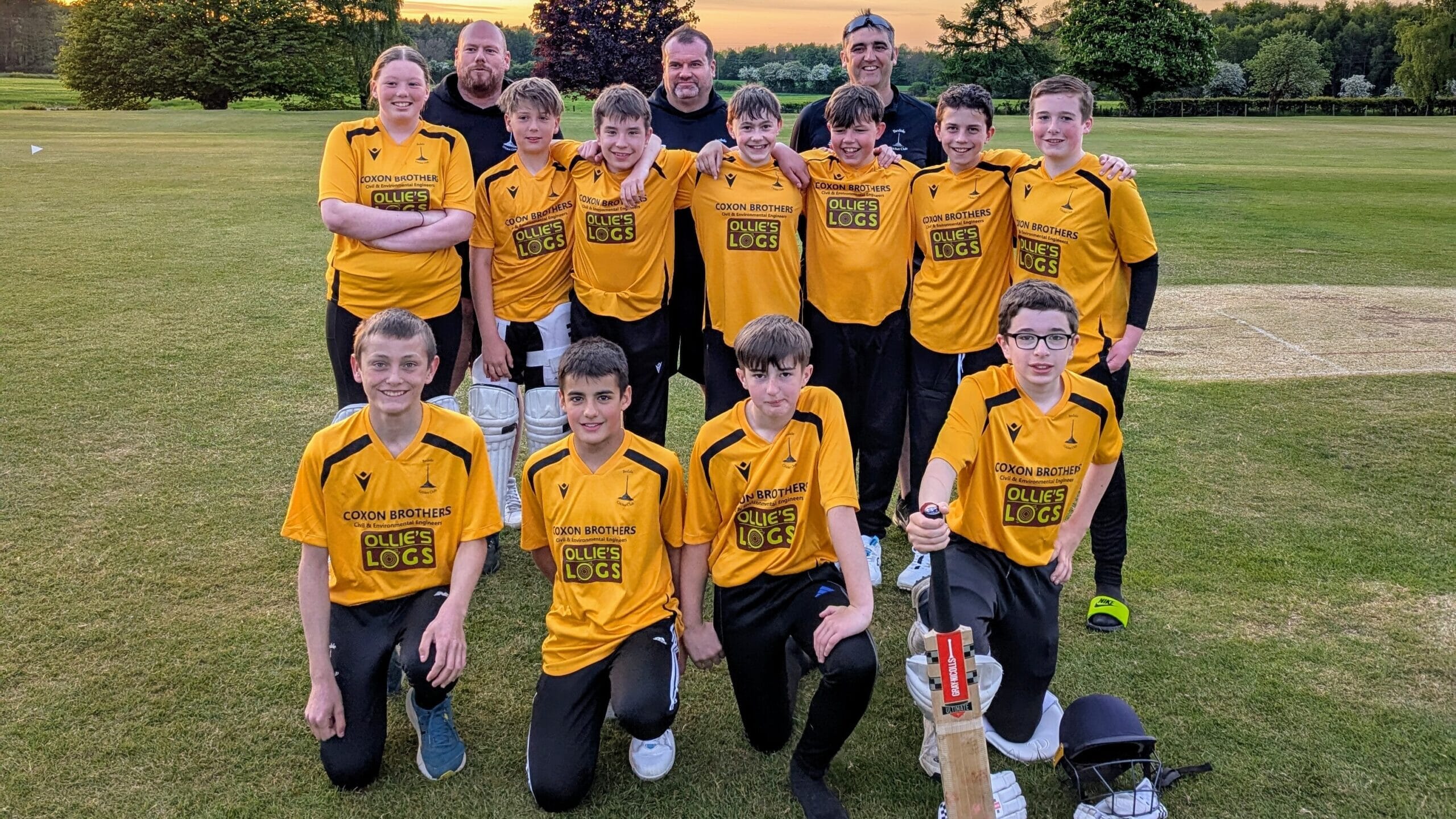 Bedale Cricket Club members gathered on the pitch, representing how the club simplified payments and communication through Spond.