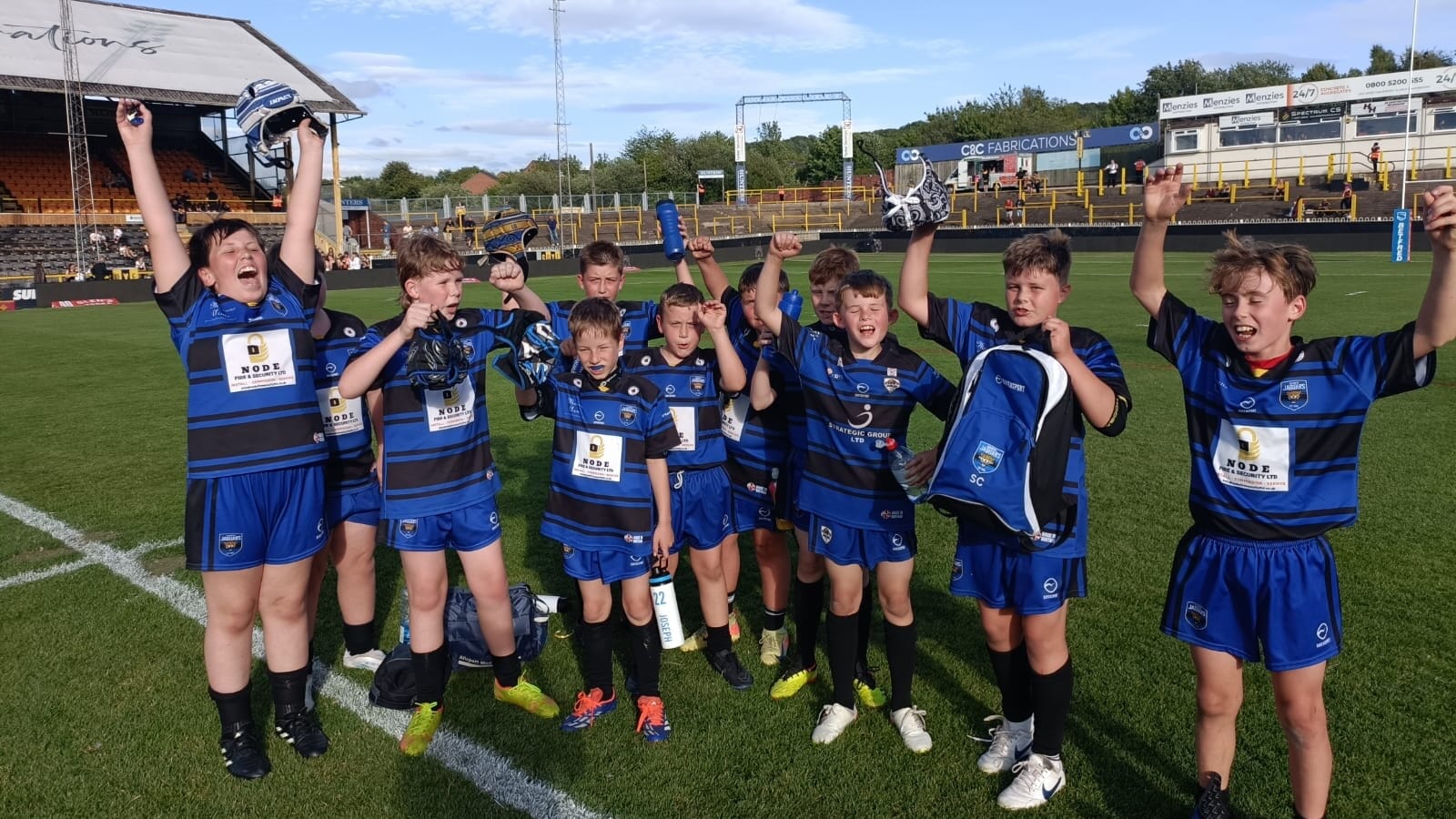Coach Martyn Dickinson of Ackworth Jaguars discussing training plans using the Spond rugby league app